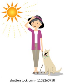 Elderly Woman Wearing A Hat Walking With A Dog