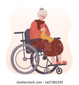 Elderly woman in wheelchair knitting yellow wool