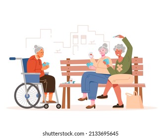 Elderly women play cards on a bench in a city park. An old woman in a wheelchair and her friends. Vector illustration in a flat style.