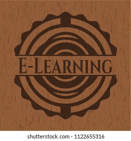 E-Learning badge with wooden background