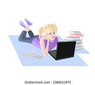 E-learning, girl lying on floor with laptop.