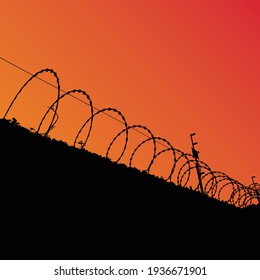 Electric barbed wire fence under orange sky vector silhouette
