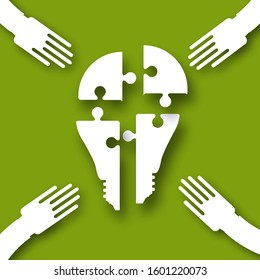 Electric bulb. Puzzles in the form of a light bulb. Concept of big idea. People hand holding shaes. Work together. Business idea. Teamwork. Strategy. Green background.