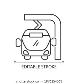 Electric bus en route charging linear icon. Filling up battery of tourism bus. Thin line customizable illustration. Contour symbol. Vector isolated outline drawing. Editable stroke