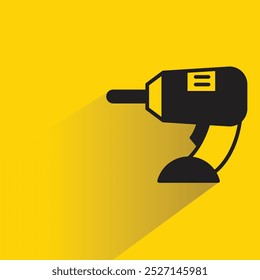 electric drill icon with shadow on yellow background