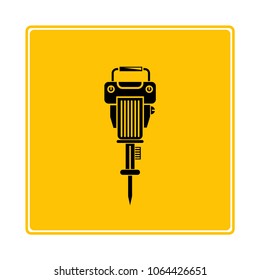 electric drill machine on yellow background