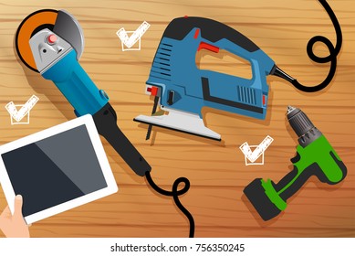 Electric jigsaw and screwdriver on table. Flat design and digital tablet in hand