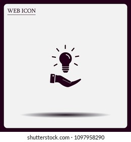 Electric light bulb in the palms, vector icon.