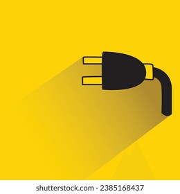 electric plug with shadow on yellow background