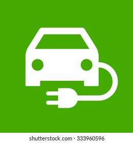 Electric powered car on green background