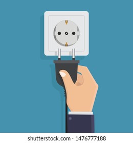 Electrical outlet and hand holding electric plug with blue background flat design vector illustration