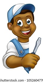 An electrician or builder contractor holding a screwdriver hand tool and peeking around from behind a sign