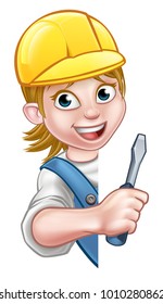 An electrician or builder woman contractor in hard hat holding a screwdriver hand tool and peeking around from behind a sign