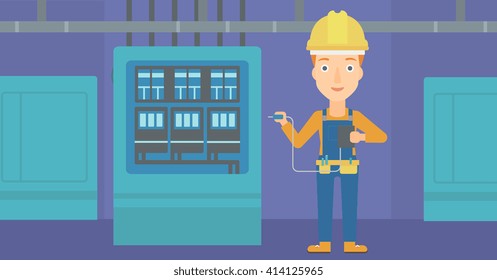 Electricista con equipo eléctrico.
