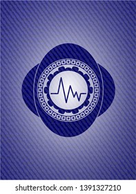 electrocardiogram icon inside badge with jean texture