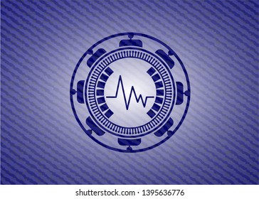electrocardiogram icon inside badge with jean texture