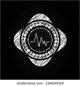electrocardiogram icon inside chalkboard emblem