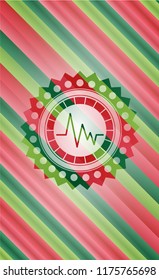 electrocardiogram icon inside christmas badge background.