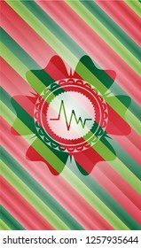 electrocardiogram icon inside christmas colors emblem.