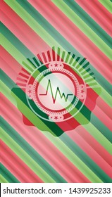 electrocardiogram icon inside christmas emblem.