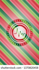 electrocardiogram icon inside christmas style emblem.