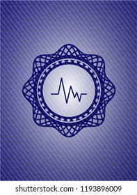 electrocardiogram icon inside emblem with jean background
