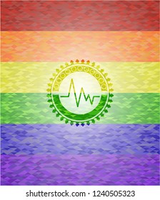 electrocardiogram icon inside emblem on mosaic background with the colors of the LGBT flag