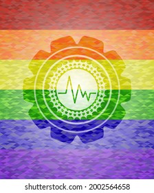 icono del electrocardiograma dentro del emblema sobre el fondo del mosaico con los colores de la bandera LGBT. 