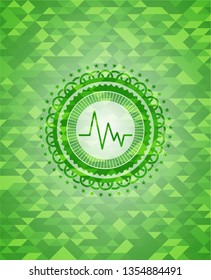 electrocardiogram icon inside green emblem. Mosaic background