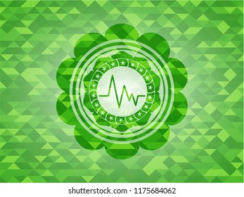electrocardiogram icon inside green mosaic emblem