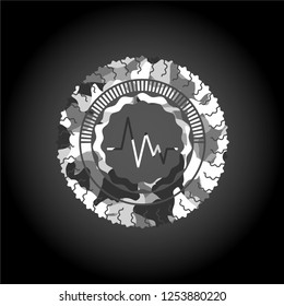 electrocardiogram icon inside grey camo emblem