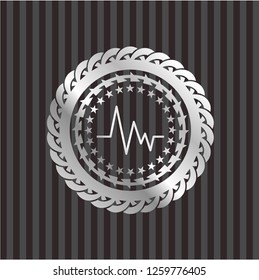 electrocardiogram icon inside silver shiny emblem