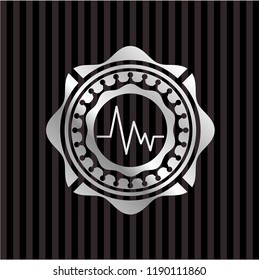 electrocardiogram icon inside silvery badge or emblem
