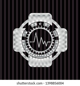 electrocardiogram icon inside silvery badge