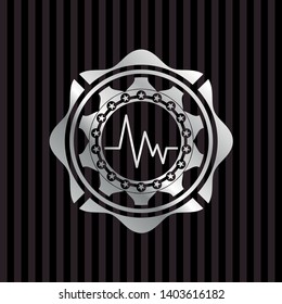 electrocardiogram icon inside silvery badge