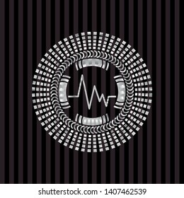 electrocardiogram icon inside silvery emblem