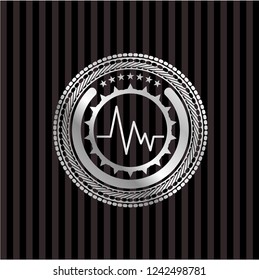 electrocardiogram icon inside silvery shiny badge