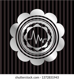 electrocardiogram icon inside silvery shiny emblem