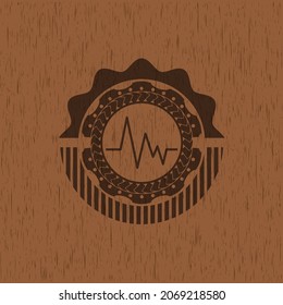 electrocardiogram icon inside wood emblem. Vintage. 