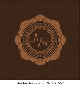 electrocardiogram icon inside wood signboards