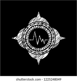 electrocardiogram icon on chalkboard