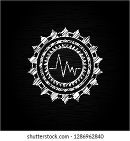 electrocardiogram icon on chalkboard