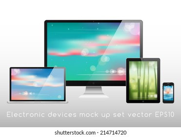 Electronic devices mockup set - laptop, monitor, tablet and smartphone vector illustration