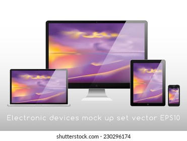 Electronic devices mockup set - laptop, monitor, tablet and smartphone vector illustration