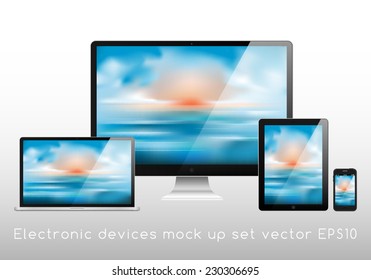 Electronic devices mockup set - laptop, monitor, tablet and smartphone vector illustration