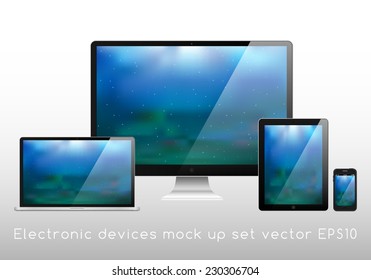 Electronic devices mockup set - laptop, monitor, tablet and smartphone vector illustration