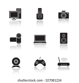 Electronic equipment drop shadow icons set. Digital photo and video cameras. Black cast shadow silhouettes illustrations isolated on white. Computer technology items. Vector infographics elements