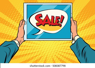 Electronic tablet in hand, sale, pop art retro vector. Computer sales, cyber Monday sales