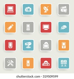 Electronics icons with color buttons on gray background.