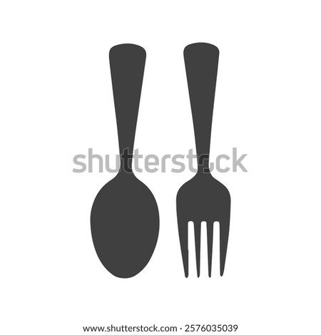 The Elegance of a Fork and Spoon in Shadow